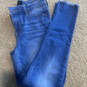 Girls skinny jeans. Frayed at the bottom. Size 12.